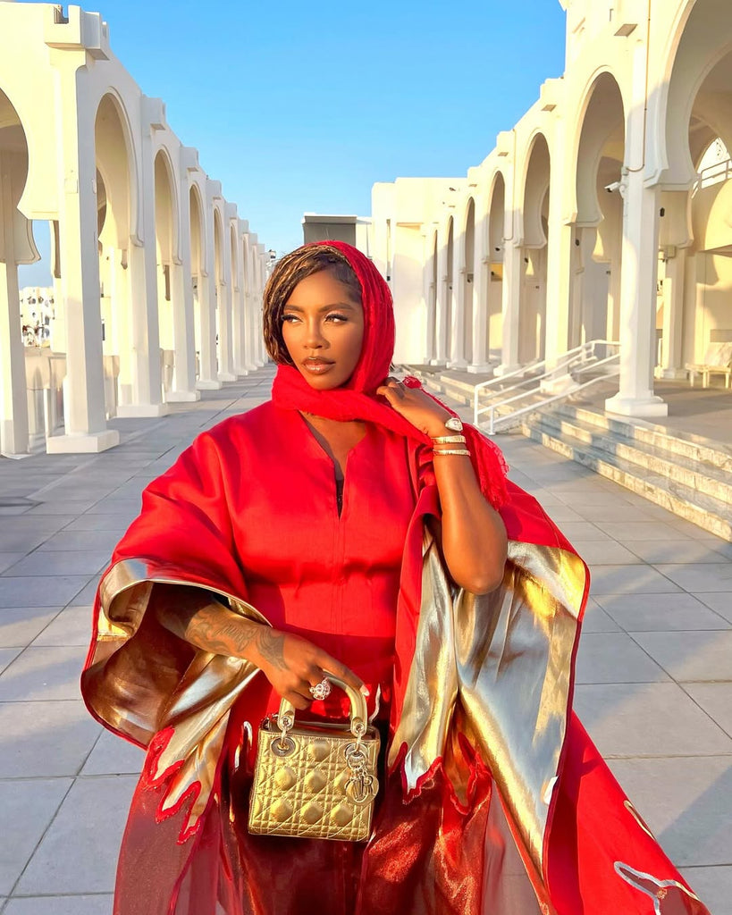 Tiwa Savage in the Ember Glow Agbada – Power in Motion